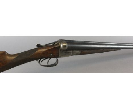 A W.W Greener side-by-side boxlock shotgun, 30"  barrel, 117cm overall, serial number 5024L, also a W.W Greener leather and c