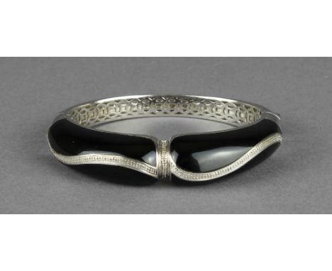 A modern silver and onyx bangle, 7.5cm wide, hallmark for Birmingham 2009.  Good condition throughout