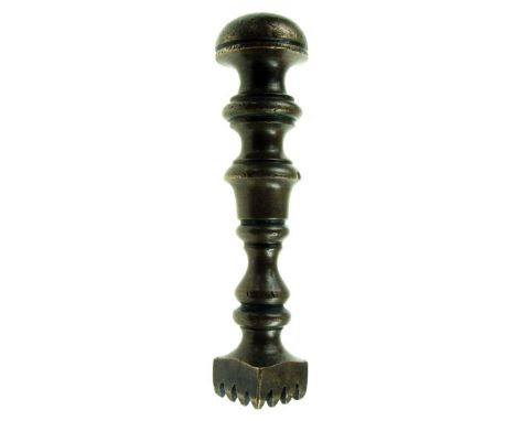 An all metal copper allow pastry print of baluster form with 'mushroom' top, square print, early 19th century. 10.50cm long I