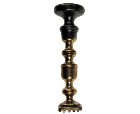 A fine bi-metal pastry print with copper baluster stem, square print and steel knop, early 19th century. 12.2cm long In excel