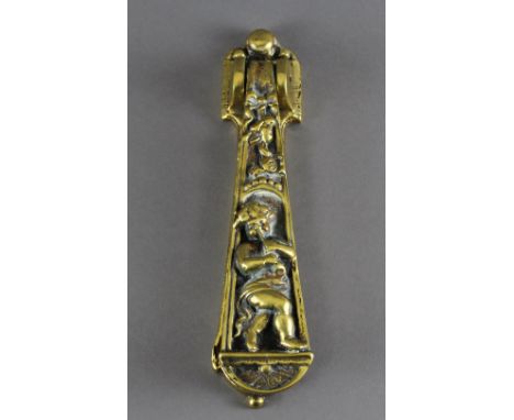 A brass door knocker, cast with putti, 23cm long, impressed to reverse 'A. Kenrick & Sons, No. 426' With surface wear