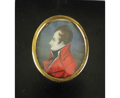 A 19th century portrait miniature of a military officer in red tunic, signed Villew, possibly French. 7cm x 5.5cm Warping.