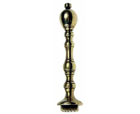 A good George III brass pastry print with ovoid finial, baluster stem and circular foot with square print, late 18th century.