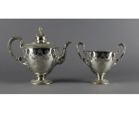 A Victorian silver two piece teaset, teapot and sugar by Edward, Edward Junior, John and William Barnard, London 1865. 22cm h