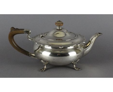 A 1930's silver teapot, Birmingham 1935, maker William Suckling Ltd, 720grams 25.3oz, sold with other silver items, sugar bow