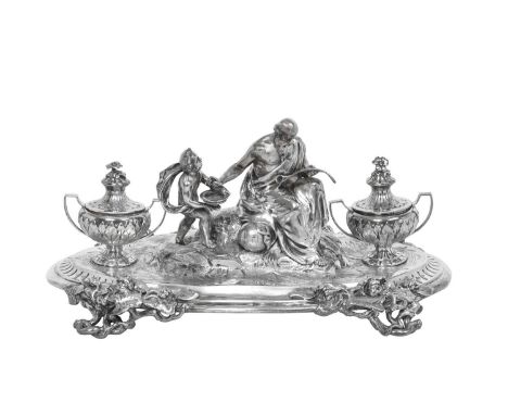 A Victorian Silver Inkstand, by John Samuel Hunt, London, 1855  shaped oval and on four cast lily pad, flower and openwork br