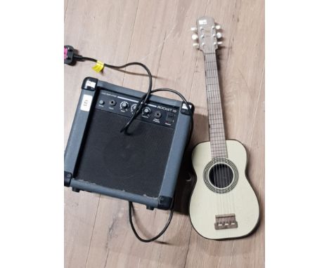 ROCKET 10 LEAD AMPLIFIER AND CHILDS ACOUSTIC GUITAR