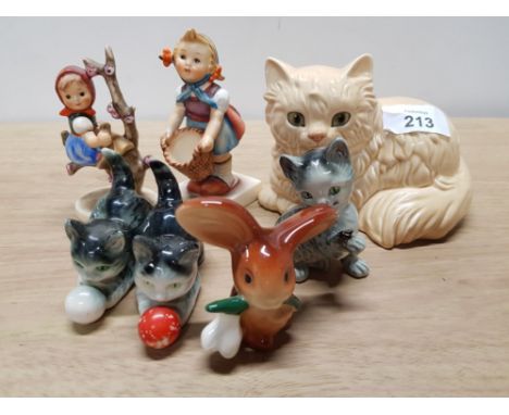 7 WEST GERMAN FIGURES INCLUDES 2 HUMMEL FIGURES AND GOEBEL CAT ETC