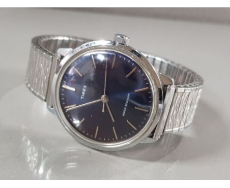 GENTS TIMEX WRISTWATCH WITH ELASTICATED STRAP AND BASE METAL BEZEL