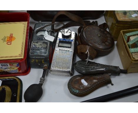 THREE VARIOUS SHOT FLASKS, to include wooden circular with strap, (one flask is a.f), together with a Carbon Monoxide Detecto