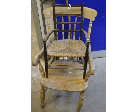 A PERIOD OAK AND ELM SPINDLE BACK WINDSOR ARMCHAIR, rushed seat, child's chair, woollen rug, red ground, a walnut circular oc