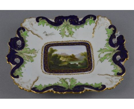 A ROYAL WORCESTER TWIN HANDLED RECTANGULAR DISH, with hand painted insert depicting river and landscape scene, indistinctly s