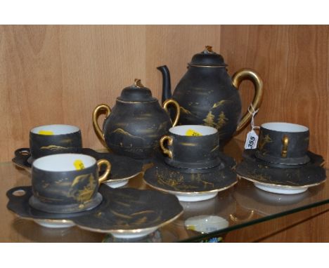ORIENTAL EGGSHELL PART TEASET, gilt scenes on black ground, to include teapot, covered sugar and four cups/saucers