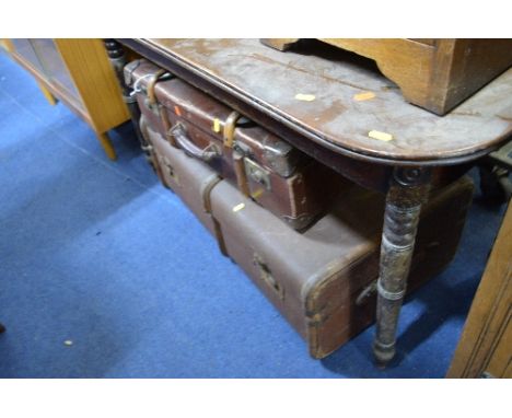 A TRAVELLING TRUNK, smaller travelling suitcase and three various reeded boxes (5)