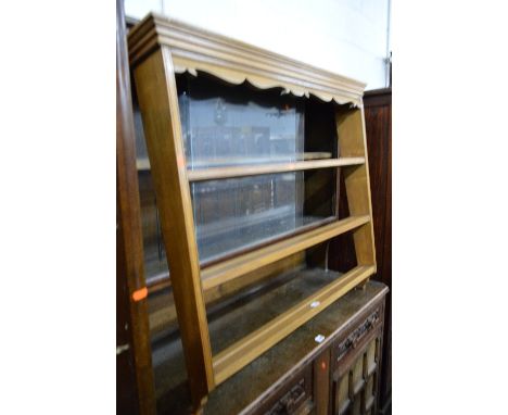 A LIGHT OAK HANGING PLATE RACK