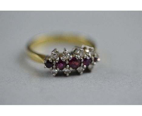 AN 18CT RUBY AND DIAMOND RING, ring size M, approximate weight 4.7 grams