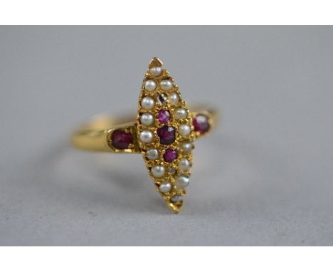 A LATE 19TH TO EARLY 20TH CENTURY RUBY, DIAMOND AND SEED PEARL NAVETTE SHAPED 'UP FINGER' RING, head measuring approximately 