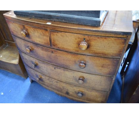A GEORGIAN MAHOGANY BOW FRONT CHEST, of two short and three long drawers with turned handles on bracket feet, approximate siz