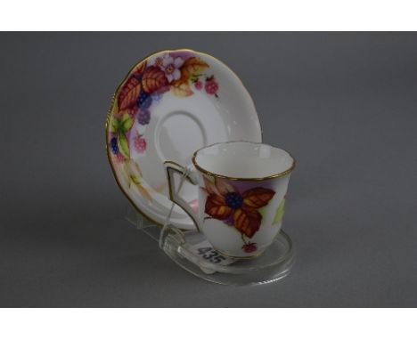 A ROYAL WORCESTER KITTY BLAKE 'BRAMBLES' COFFEE CUP AND SAUCER