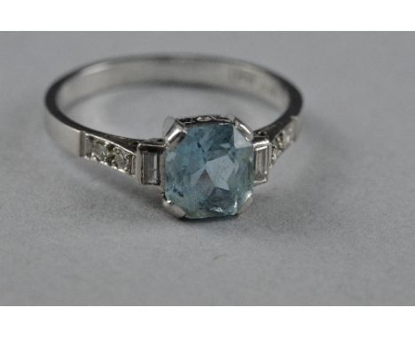 AN ART DECO 18CT AQUAMARINE RING, set with diamond shoulders, ring size K, approximate weight 2.4 grams (boxed) 