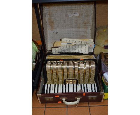 A CASED HOHNER 'ARIETTA IM' BASS ACCORDION