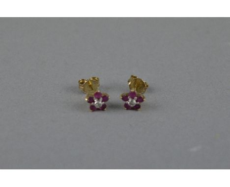 A PAIR OF 9CT RUBY AND DIAMOND CLUSTER EARRINGS, approximate weight 1.1 grams