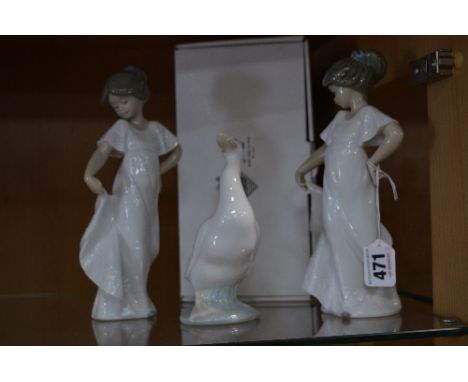 TWO NAO 'HOW PRETTY' FIGURES, No.1110, one with a box, together with a Nao Duck (3)