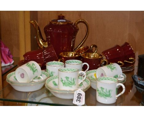 SIX ROYAL WORCESTER COFFEE CANS/SAUCERS, green dragon pattern (12), together with Wade 'Royal Victoria' burgundy and gold cof