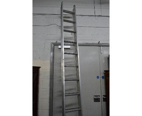 AN ALUMINIUM EXTENSION LADDER, (6.1m extended) and a set of aluminium steps (2)