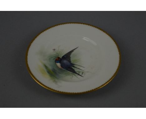 A SMALL ROYAL WORCESTER 'SWALLOW' CABINET PLATE, signed 'Powell', diameter approximately 12cm