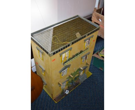 SCRATCH OR KIT BUILT WOODEN DOLLS HOUSE, modelled as a three storey town house, rear access to seven rooms, wired for electri