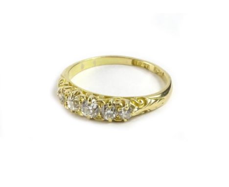 A Victorian 18ct gold gypsy ring, set with five round brilliant cut diamonds, in claw setting, approx 0.75cts in total, with 