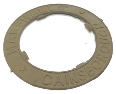 A cast brass steam or traction engine roundel, stamped Marshalls Gainsborough, 55cm dia.