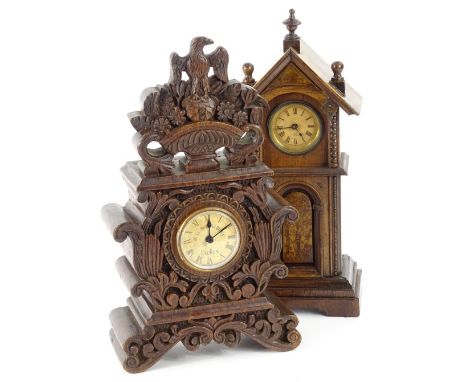 A Junghans late 19thC walnut timepiece, modelled in the form of a longcase clock and embellished with decorative gilt panels,