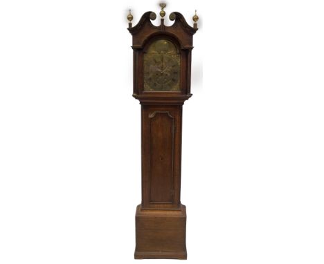 An 18thC oak longcase clock, with dentil moulded swan neck and fluted pillared hood, ball and spike and ball and eagle finial