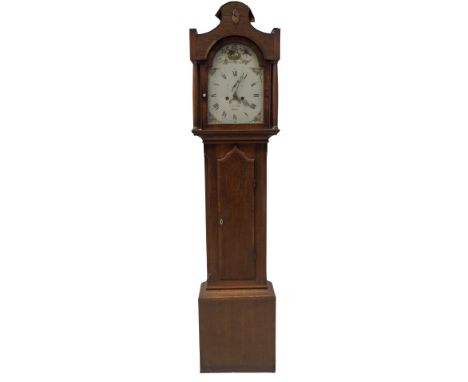 An early 19thC oak longcase clock, with shaped and mahogany crossbanded pillared hood, shaped and crossbanded door, within a 