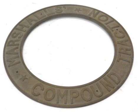 A cast brass traction or steam engine roundel, stamped Marshall Traction Compound, 54cm dia.