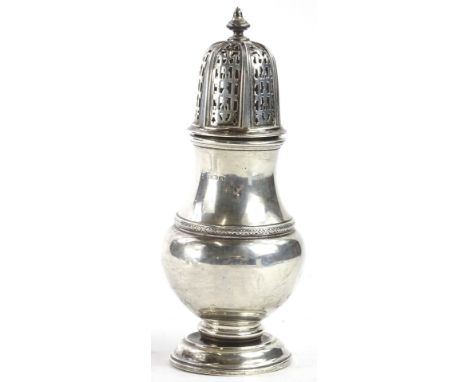 A Victorian silver sugar castor, with a turned finial and engraved and pierced lid, on a domed foot, stamped to underside The