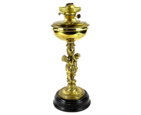 A 20thC brass oil lamp, with figural column and ebonised base, 49cm H.