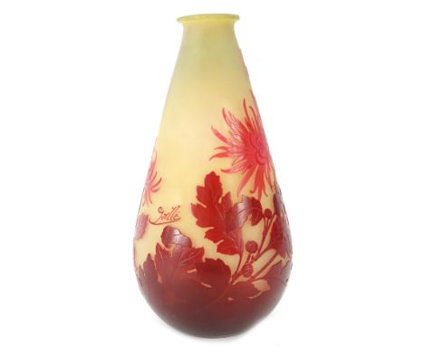 An Art Glass vase, with ruby tinted acid etched decoration of chrysanthemums, leaves etc., bearing the name Gallé, 31cm H.