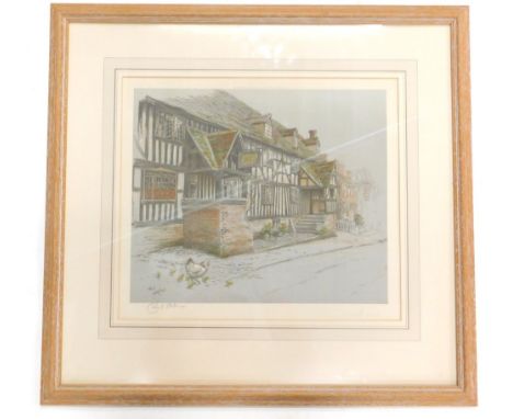 Cecil Aldin. Rear view of an inn, with figure and cat, artist signed coloured print with blind stamp, 43cm x 38cm.