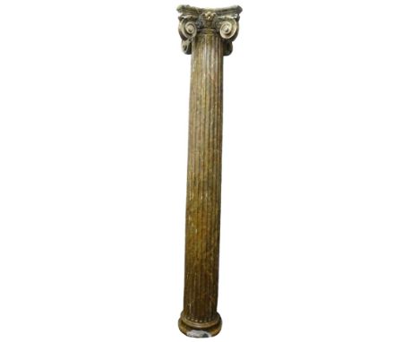 A set of four Regency gesso and parcel-gilt architectural columns, each with an Ionic capital, later simulated marble paint, 