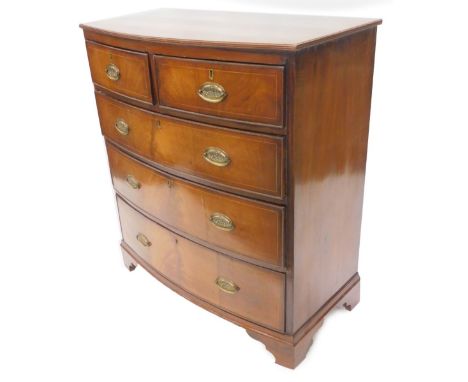 A 19thC mahogany and boxwood strung bow fronted chest of drawers, the top with a reeded edge, above two short and three long 