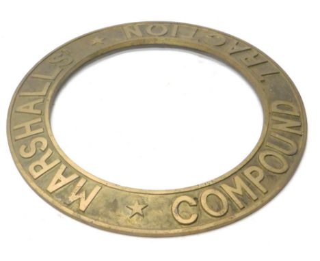 A cast brass steam or traction engine roundel, stamped Marshalls Traction Compound, 55cm dia.