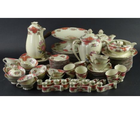 An extensive Limoges porcelain part dinner and tea service, to include cups, saucers, teapot, coffee pot, tazza, plates, choc