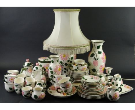 A Mettlach Wild Rose pattern part tea and dinner service etc., to include vases, lamp base, cups, saucers, dishes etc.