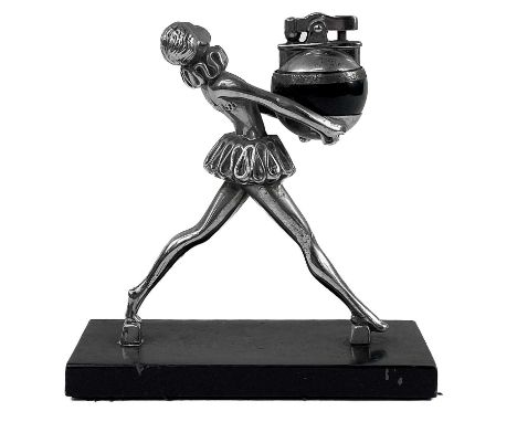 A Ronson Art Deco chrome table lighter. Circa 1930, modelled a young woman in full stride, supporting the spherical lighter b