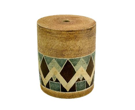 A Troika cylinder lamp base decorated with chevron design. Height 14.5cm diameter 12.5cm.No condition issues to report.