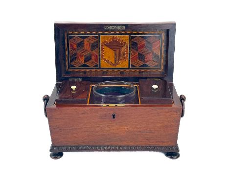 A William IV rosewood sarcophagus shape tea caddy. With applied quarter reel and bobbin mouldings, the hinged cover with geom