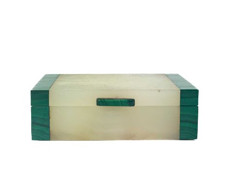 A malachite banded Art Deco white marble cigarette box. With silver gilt hinge, width 12cm.There is a crack and repair on the